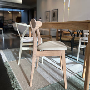 Carl Hansen Wegner CH30 Dining Chair Oak White Oil with Cream Leather Loke 7210 seat in showroom with nanimarquina tres sage rug