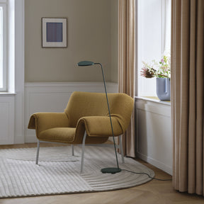 Muuto Relevo Rug Off White in Copenhagen Living Room with Wrap Lounge Chair and Leaf Floor Lamp