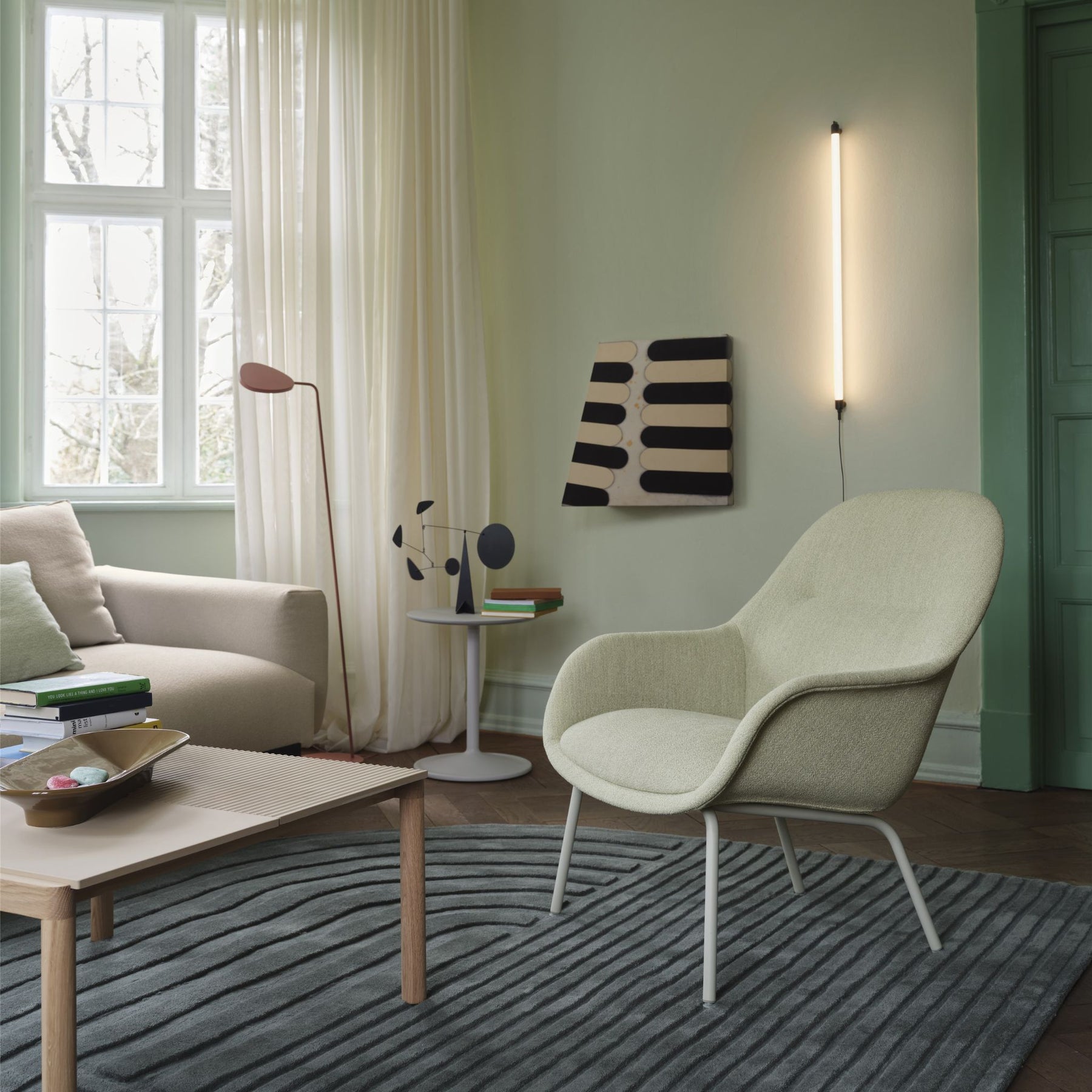 Muuto Relevo Rug Dark Green in Living Room with Fiber Lounge Chair