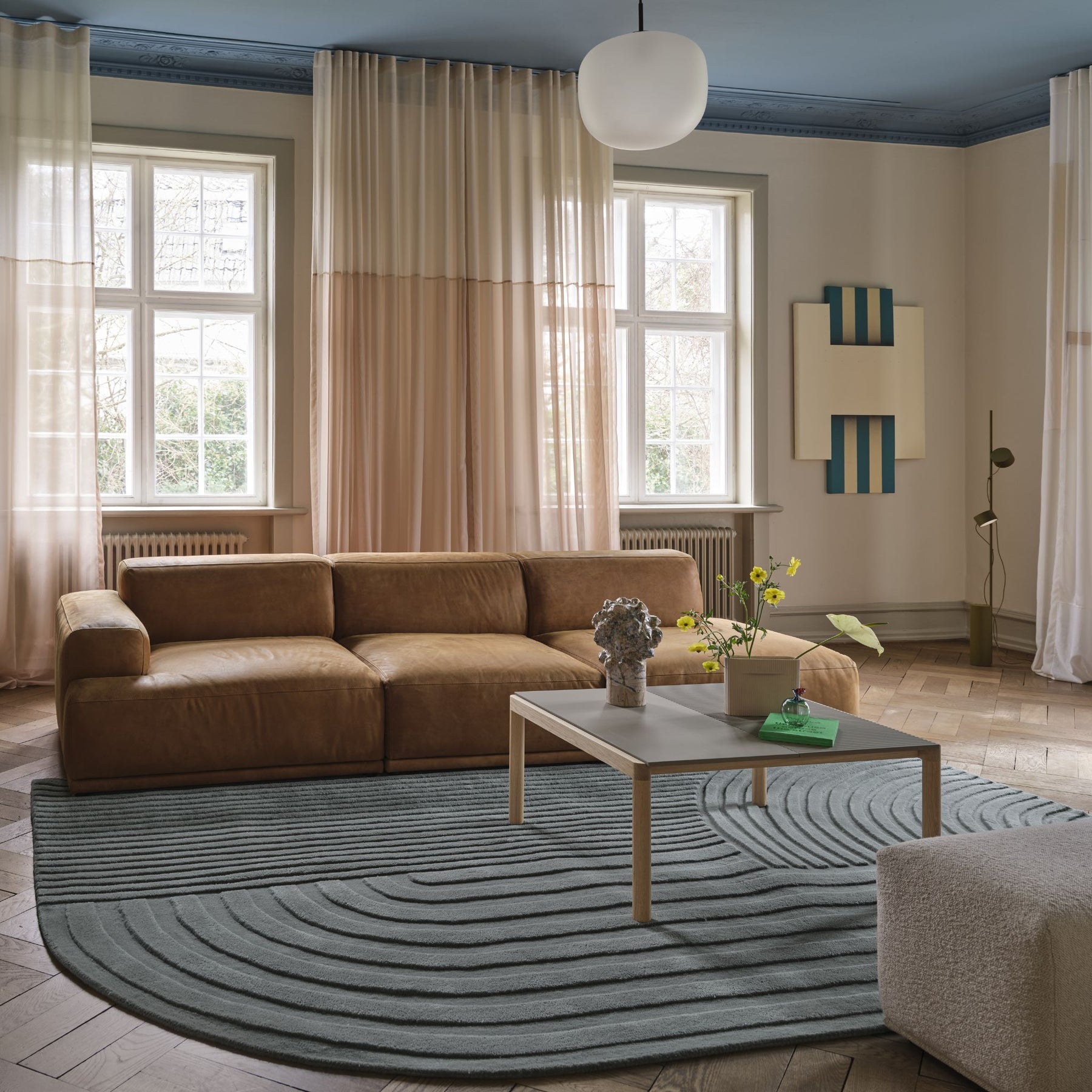 Muuto Relevo Rug Sage Green in Living Room with Connect Soft Sofa in Leather adn Rime Pendant Light