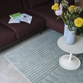 Muuto Relevo Rug Sage Green in Living Room with Soft table, Flowers, and In Situ Sofa