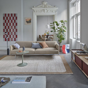 Muuto Soft Side Table Dusty Green in Copenhagen Living Room with Burnt Orange Ply Rug and Outline Sofa 