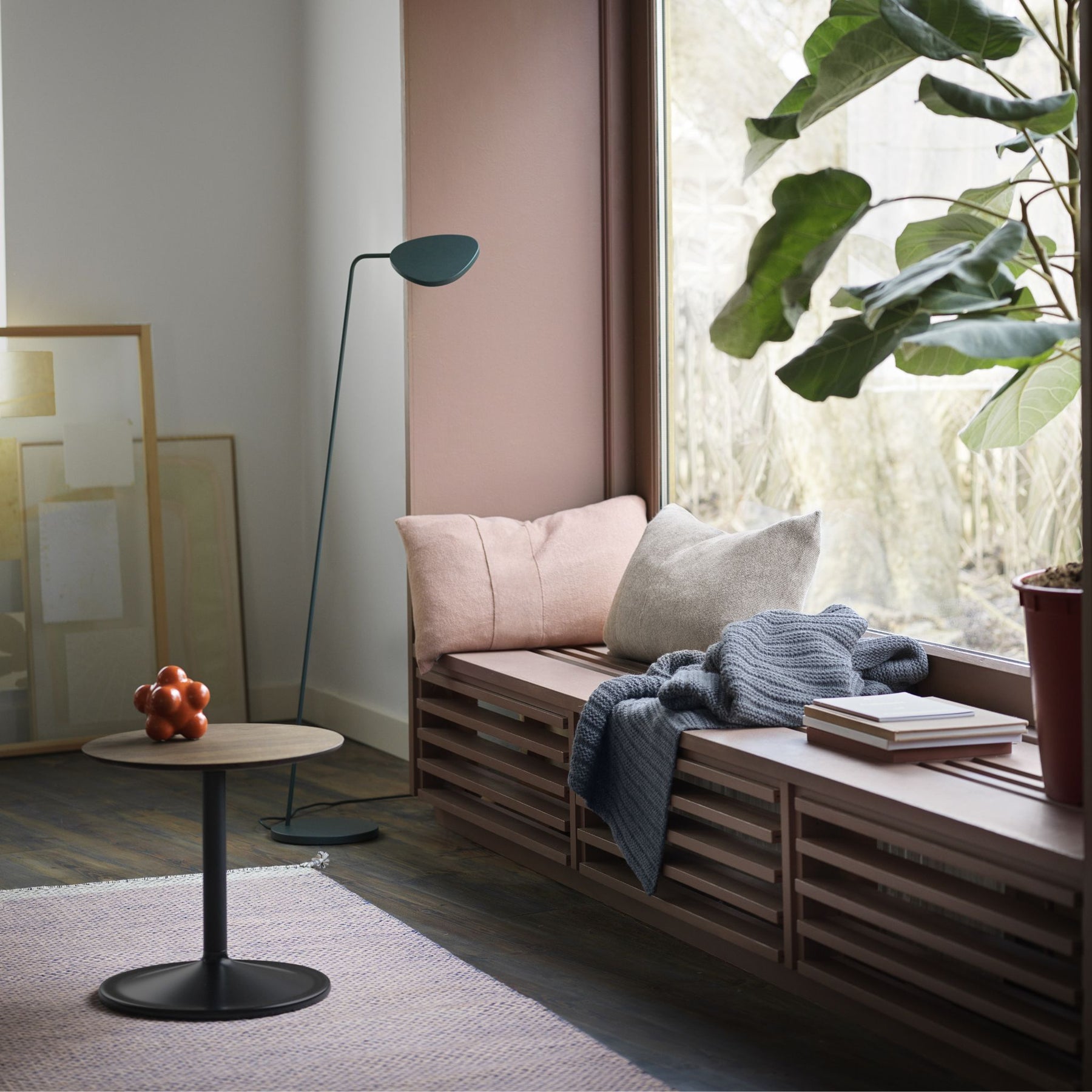 Muuto Soft Side Table Smoked Oak Top Black Base in Reading Nook by Window with Leaf Floor Lamp