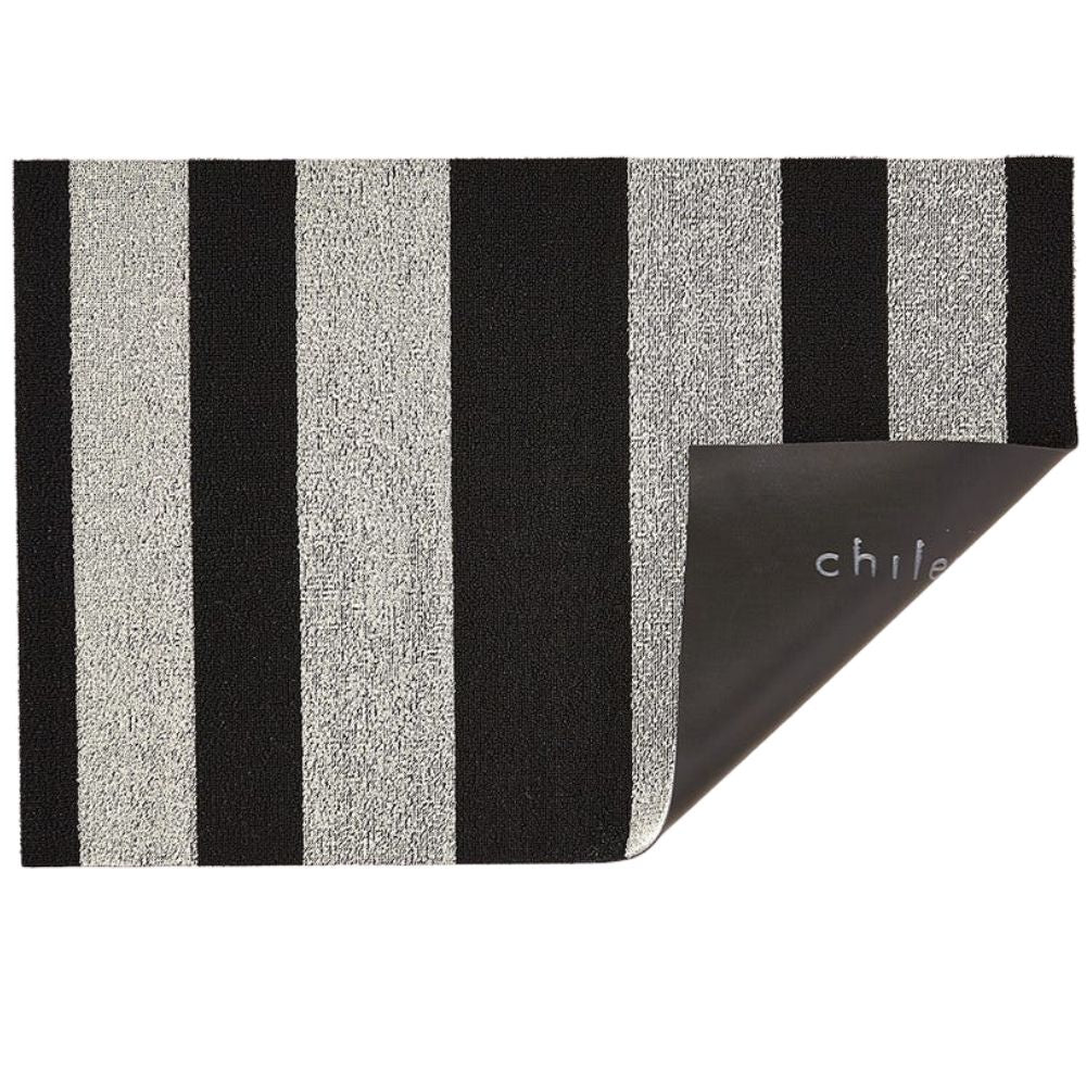 https://www.paletteandparlor.com/cdn/shop/products/chilewich-bold-stripe-shag-mat-black-white_1000x.jpg?v=1595787490